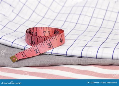 measuring tape is on cotton fabric sewing concept sewing from natural stock image image of