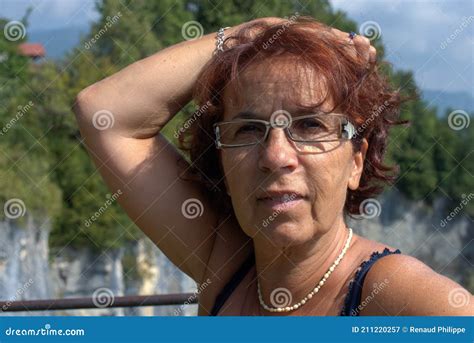Portrait Of Beautiful Tanned Mature Brunette With Eyeglasses Stock Image Image Of Smiling