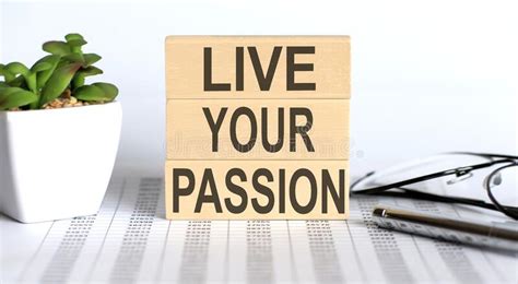 Live Your Passion Text On Sticky Note On A Cork Board With Pencil Stock