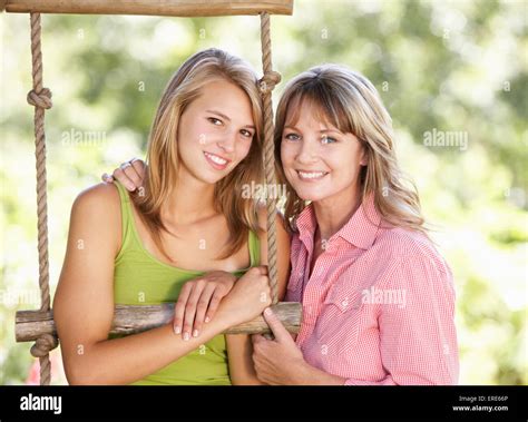 Mother And Teenage Daughter By Treehouse Stock Photo Alamy