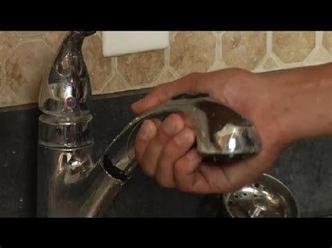 Be careful not to drop the small washer inside the nozzle of the hose end. How to Repair a Single-Handle Kitchen Faucet With a Spray ...