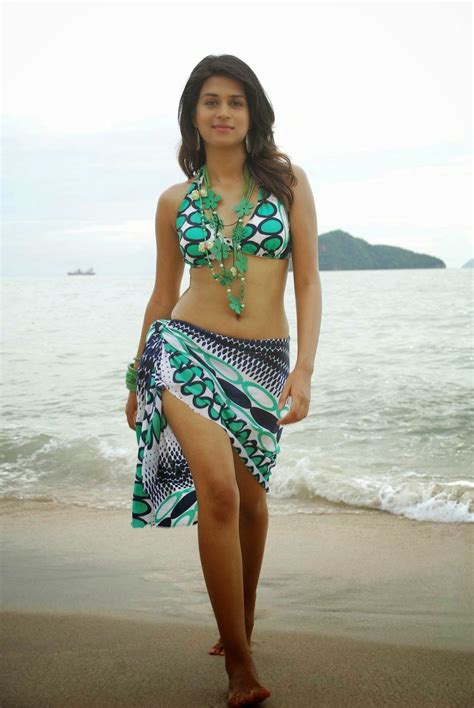 Hot Gallery Shraddha Das Showcasing Her Amazing Body In A Colorful Bikini In Telugu Film Mugguru