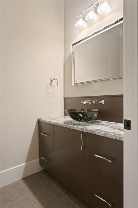 Modern Gray And Brown Powder Room With Round Vessel Sink