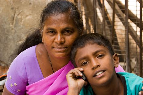 File:Bangalore mom and son on cellphone November 2011 -14-2.jpg