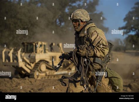 A Us Army Reserve Combat Engineer Soldier With The 350th Engineer