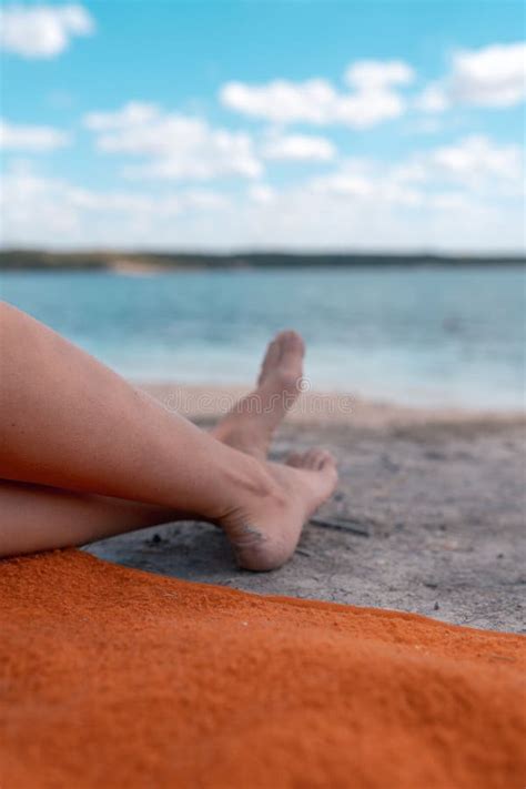 Vacation Concept Close Up Of Female Legs By The Beach Stock Image