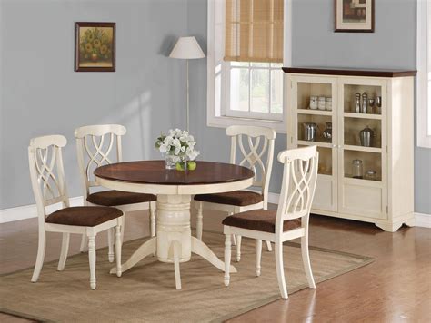 The chairs and table showcase. Beautiful White Round Kitchen Table and Chairs - HomesFeed