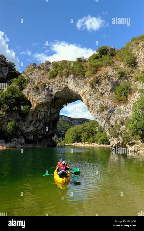 Canoeing To The Natural Stone Arch Of Pont Darc In The Gorges De L