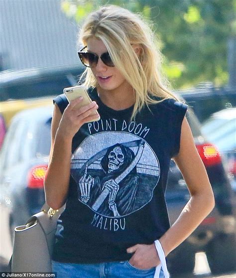 charlotte mckinney shows slender legs in daisy dukes and treats herself in malibu daily mail