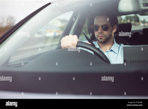 Businessman Driving A Car Stock Photo Alamy