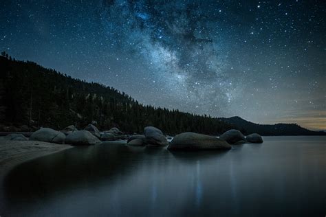 Photo Of Stars Over Body Of Water During Nighttime Nevada Lake Tahoe