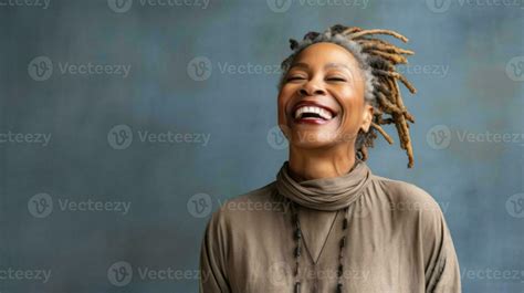 Happy Mature African Woman Smiling Cheerfully Embracing Her Natural