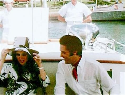 Elvis Enjoying Priscilla Trying To Hold Her Hat On During The Boat Ride To The Uss Arizona Mem