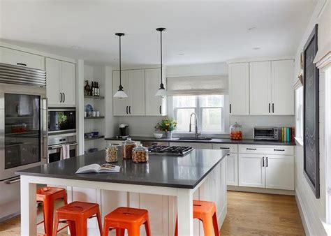 As you can see, there are many different kitchen island ideas for you to select from when designing your new kitchen. White Square Kitchen Island with Orange Tolix Stools ...