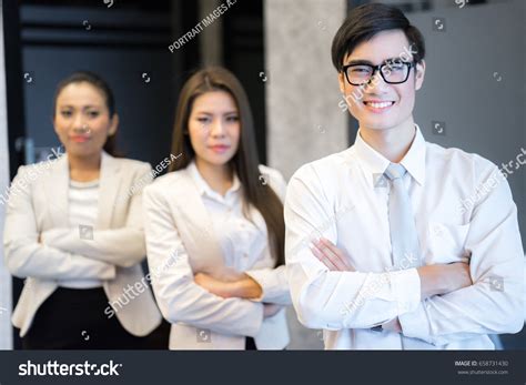 Three Happy Business People Standing Office Stock Photo 658731430
