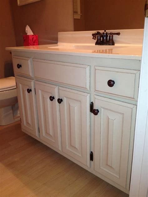 Learn how to gel stain bathroom vanity for beautiful dark oak cabinets without sanding. Our bathroom after painting 80s Honey Oak cabinets with ...