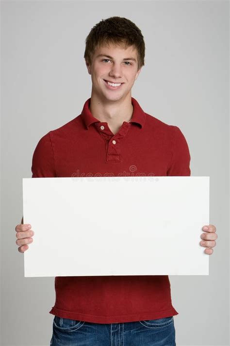 Teenage Boy Holding A Blank Sign Isolated On White Stock Image Image