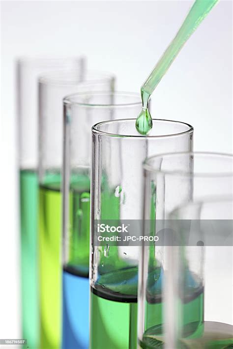 Laboratory Research Testing Tubs With Drop Of Solution Stock Photo