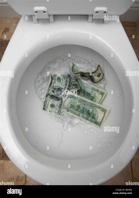 Money Down The Toilet Hi Res Stock Photography And Images Alamy