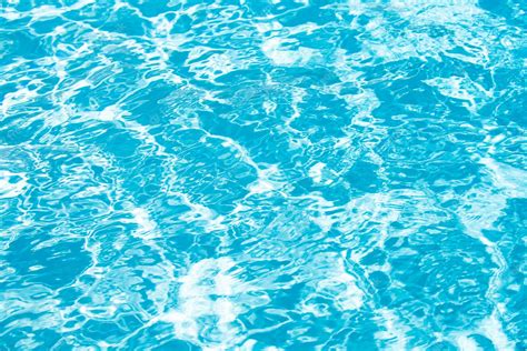 Premium Photo Background Of Blue Water In Swimming Pool With Sun