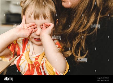 Girl Rubbing Her Eyes Stock Photo Alamy