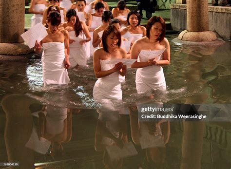 Japanese Women Wear Pray As Enter Freezing Cold Water Pond During