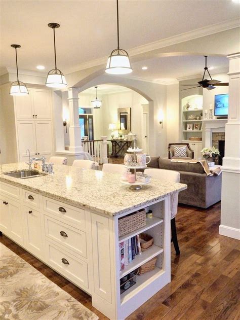 I like the way it gently contrasts with the egret white in the adjacent room. White kitchen, off-white cabinets, Sherwin Williams ...