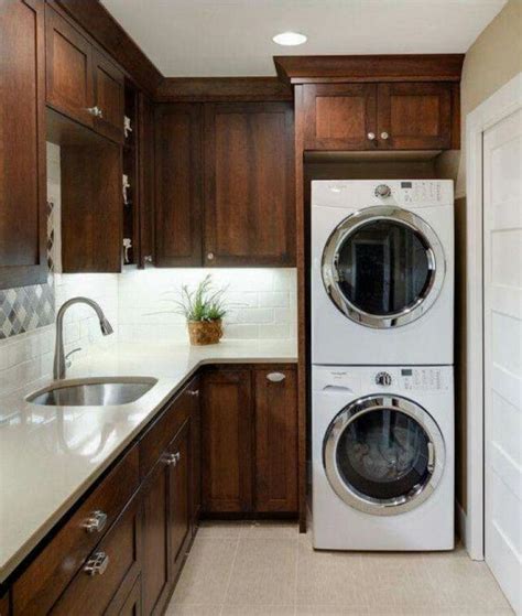 For a quick and affordable solution, hide the washer and dryer with a curtain. Washing machine in the kitchen - Spend space properly
