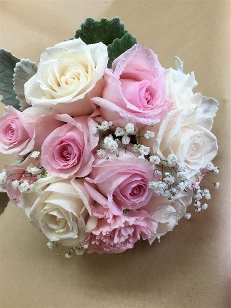 blush pink and ivory wedding bouquet by highland park florist