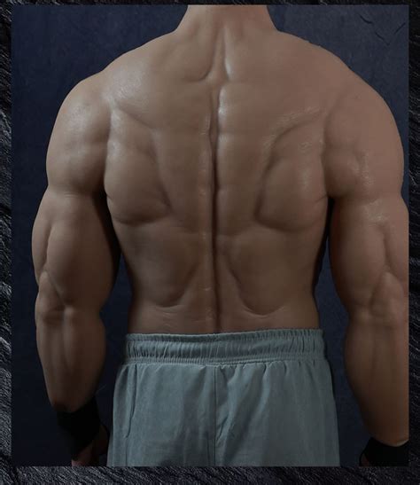 The Back Of A Man S Body Is Shown With No Shirt And Gray Shorts