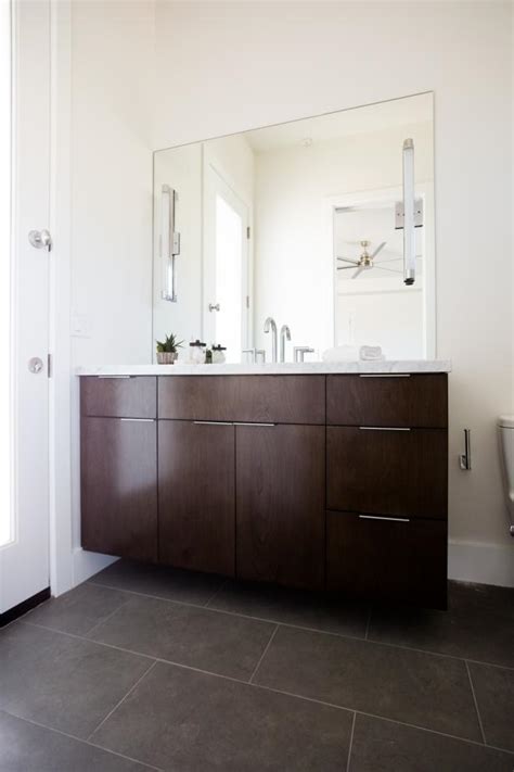 Always remember that having a bathroom mirror with accent lights placed directly above it is the worst kind of combination. Photo Page | HGTV
