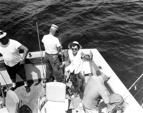 Florida Memory A Woman Fisherman Joyfully Displays Her Catch Of