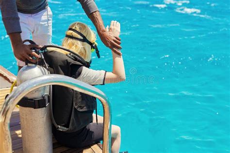 Young Woman Diver Preparing For Scuba Diving Stock Photo Image Of