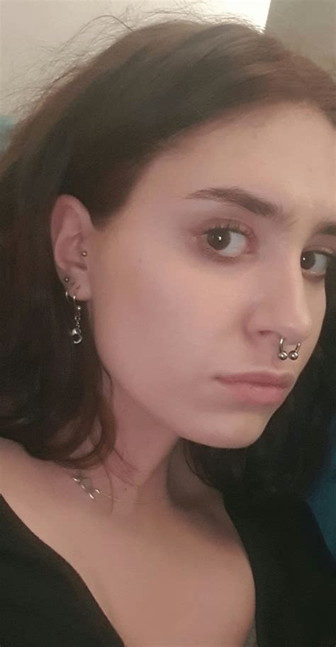 got my tragus pierced today and stretched my septum to 12g i like how it makes my nose look
