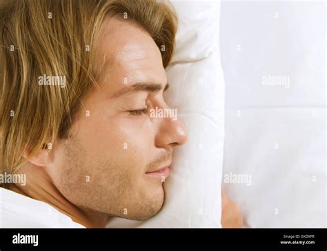 Young Man Sleeping In His Bed Stock Photo Alamy