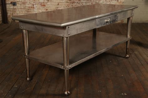 Stainless steel work tables are designed for ingredient prep, plating your menu items, holding utensils and countertop equipment until needed and otherwise creating a large enough space for your kitchen staff to work. Vintage Stainless Steel Kitchen Table at 1stdibs