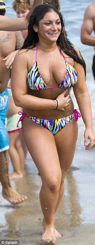 jersey shore s deena skips the gym for a tanning session in a string bikini daily mail online