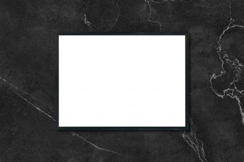 Here's the best free wall mockups which you add your own wall art design. Mock up blank poster picture frame hanging on black marble ...