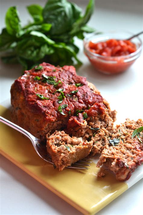 This meatloaf is tender, juicy and really flavorful! Tomato Basil Turkey Meatloaf - Little Bits of...