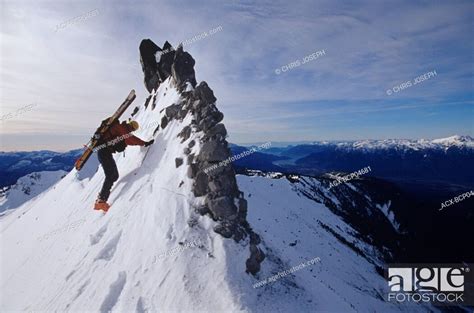 Man Climbing The Ridge Of Mount Atwell Garibaldi Provincial Park Near