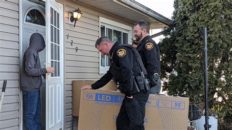 Hugs and gifts delivered for holidays by sheriff's office