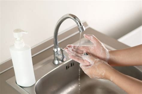 Premium Photo Woman Washing Her Hands With Soap
