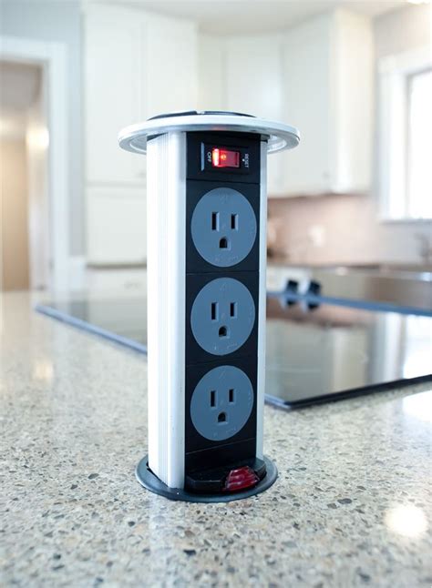 This means you can close the outlet after recharging. electrical - Popup outlet on kitchen island - is it ...
