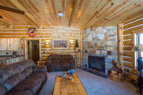 Remodeling With Exterior Log Siding And Interior Wood Siding