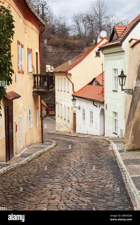 Narrow Old Street With Cobblestone Pavement In The Hradcany District