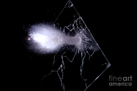 Bullet Hitting A Glass Window By Ted Kinsman Fine Art America