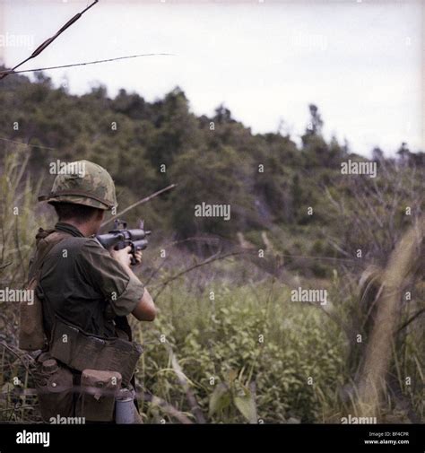 An Infantryman Of B Troop 1st Squadron 9th Cavalry Fires An M16 At