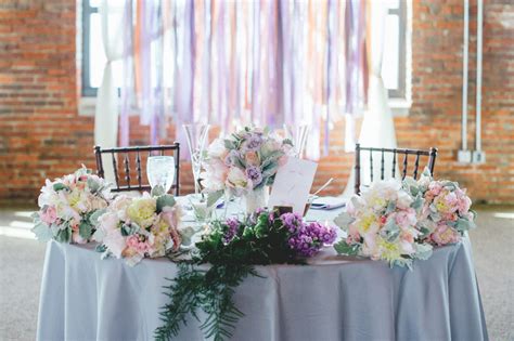 Mr and mrs wedding freestanding table sign with heart personalized last name centerpiece surname sweetheart table reception laser cut decorations gold mirror acrylic engagement bride and groom. Pretty Bride and Groom Reception Table With Pastel Flowers