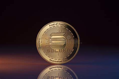 Solana Sol Crypto Coin Placed On Crypto Altcoins And Lit With Orange And Blue Lights Stock Photo