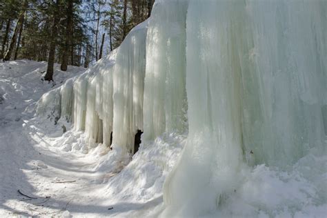 Winter Hikes Spectacular Ice Caves And Frozen Waterfalls To See In New